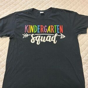 Black Kindergarten squad t shirt. Size large.